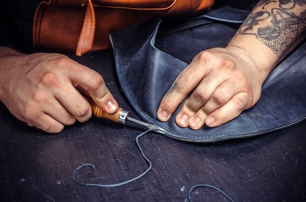 A close-up of a shoemaker's hands meticulously stitching a piece of leather on a designer shoe, highlighting craftsmanship.