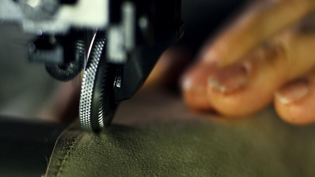 A detailed photograph showing the stitching and logo of a designer shoe, highlighting the precision and quality craftsmanship.