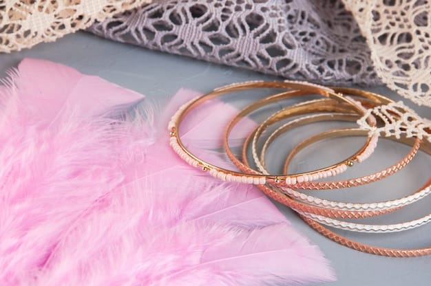 A curated display of gold and rose gold jewelry (rings, bracelets, and necklaces) arranged on textured fabrics that highlight their warm tones, subtly suggesting a harmonious pairing with warm skin.