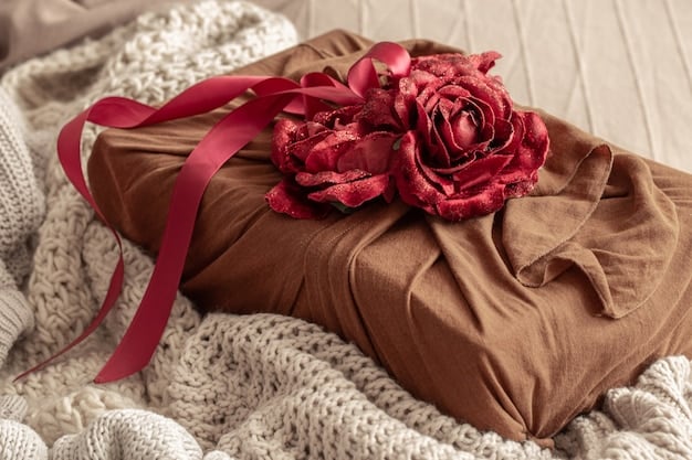 A beautifully wrapped small gift box, with a delicate silk ribbon and a tiny 