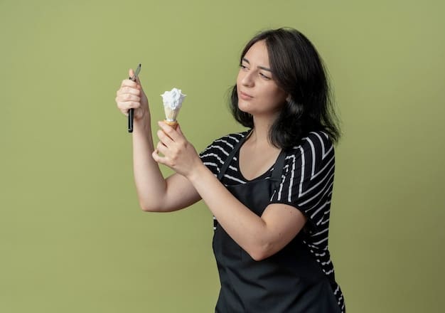 A person holding a piece of jewelry with tongs, applying a clear protective coating with a small brush, illustrating the 