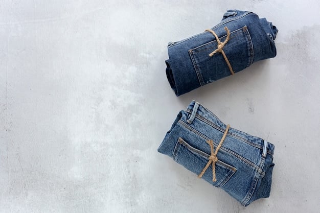A detailed flat lay of two pairs of jeans from the same brand, one labeled 