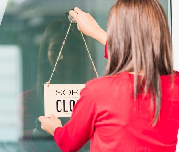 A close-up of hands sifting through a clothing rack full of stylish summer dresses at an outdoor outlet mall, a price tag showing a discount.