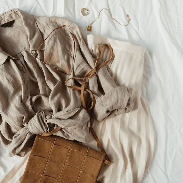 A minimalist summer capsule wardrobe laid out neatly on a bed, featuring natural fabric garments in neutral and complementary colors, emphasizing quality over quantity and thoughtful selection.